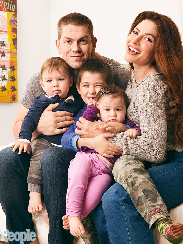 Sarah Shahi and her husband and children