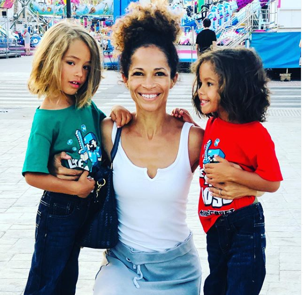 Kamar De Los Reyes And Sherri Saum