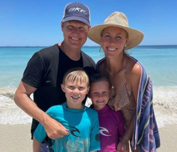 Yannik Jude with his family at the beachside.